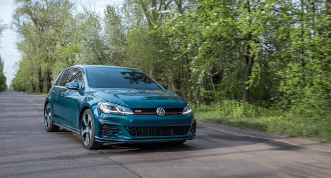 Photo of a green Volkswagen Golf GTI on the street in Charleston, SC.